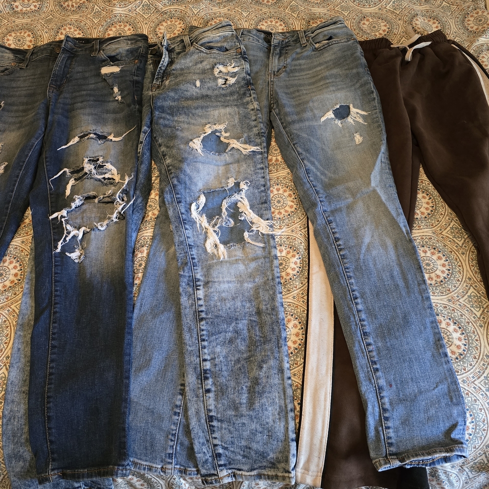 Distressed Blue Denim Jeans